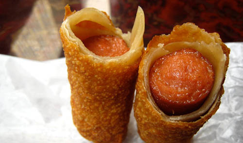 Egg Roll Dogs:  At Eden Wok, the glatt kosher Chinese and sushi restaurant in New York City, diners can find egg roll-wrapped hot dogs on the appetizer menu. The hot dog is encased in a sheet of egg-dipped and deep-fried dough.