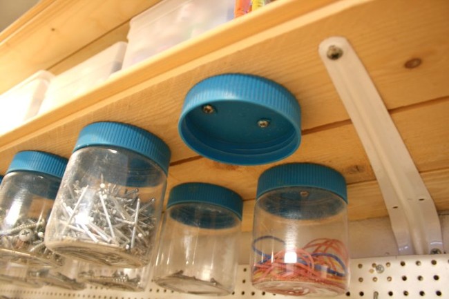 Store small objects like screws and nails using old peanut butter jars screwed to the bottom of a shelf.