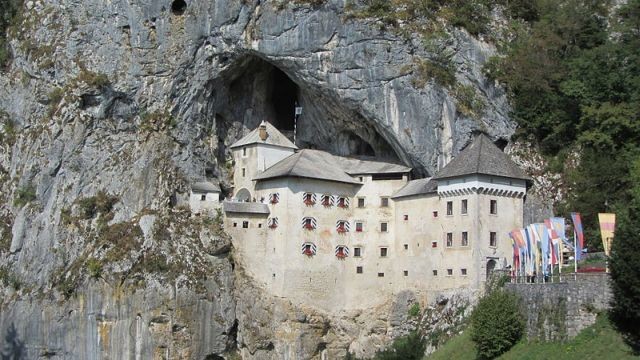 Predjama Castle, Slovenia. This 13th-century castle was built right into the entrance of Postojna cave, giving it an advantageous location in the event of an attack.