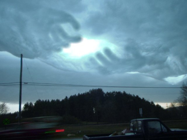 This picture claimed that a supernatural cloud formation appeared in the sky after a bad storm. The original image was actually pretty interesting, showing a round opening in the clouds, but the hands were added in later as a joke. It references an early gross-out Internet meme that shall not be named.
