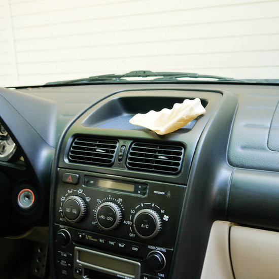 Use a coffee filter and some cleaning solution to get rid of any dust and grime on your dashboard.
