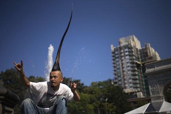 Japanese fashion designer Kazuhiro Watanabe currently holds the Guinness World Record for “tallest mohawk” at 3 feet and 8.6 inches tall.