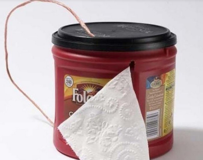 Keep your toilet paper dry by making a dispenser out of an old coffee canister.