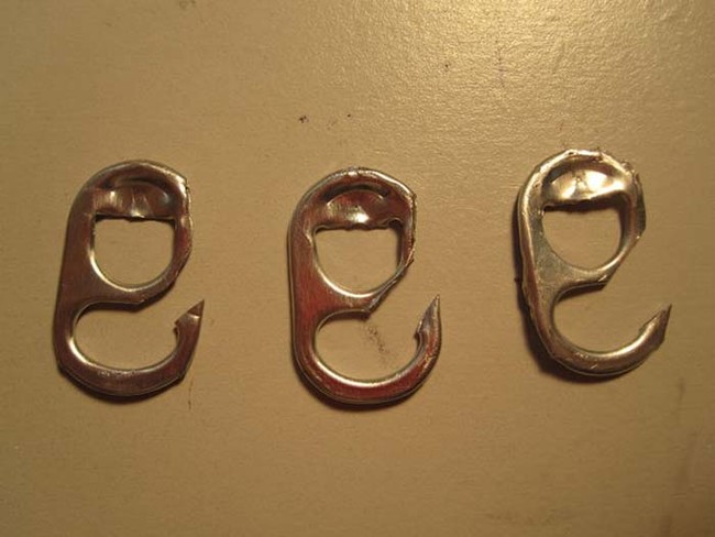 With a pair of scissors, you can make soda can tabs into hooks for fishing.