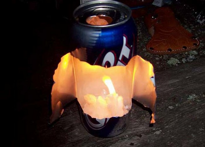 Here's an easy way to make a super-bright lantern: cut open a beer or soda can, and set a votive candle inside. The tin will reflect the light.