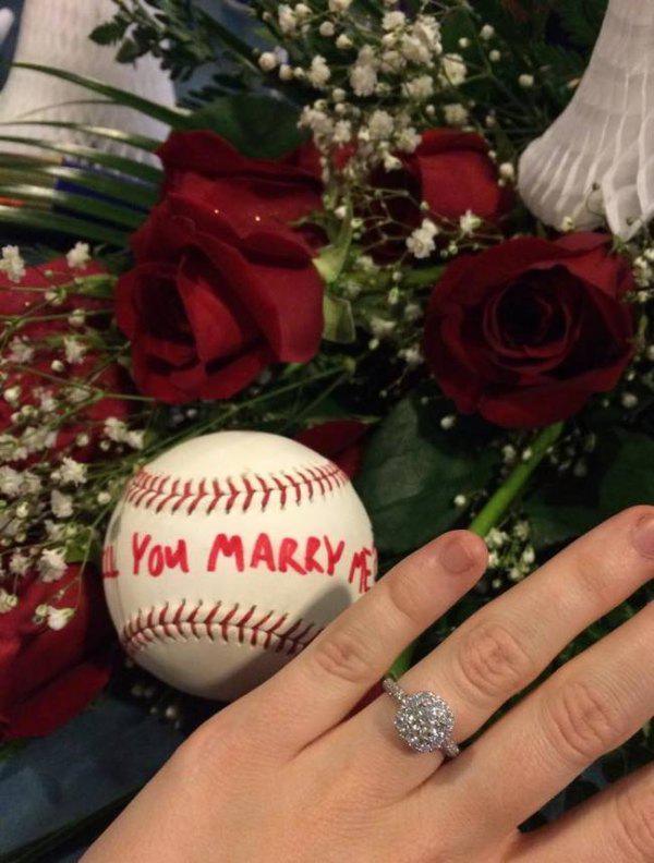 He even thought ahead by writing “Will you marry me?” on the ball.
I’ll save you the suspense, she of course said “YES!!”