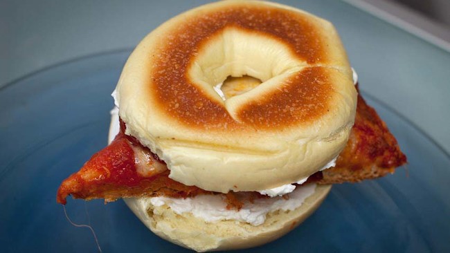 You've probably heard of pizza bagels, but this is an actual piece of pizza on a bagel.