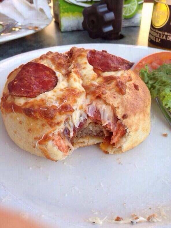 How to win at life: take a burger. Wrap it in pizza. Bake it. Eat it.