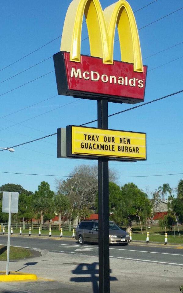 street sign - McDonald's Tray Our New Guacamole Burgar