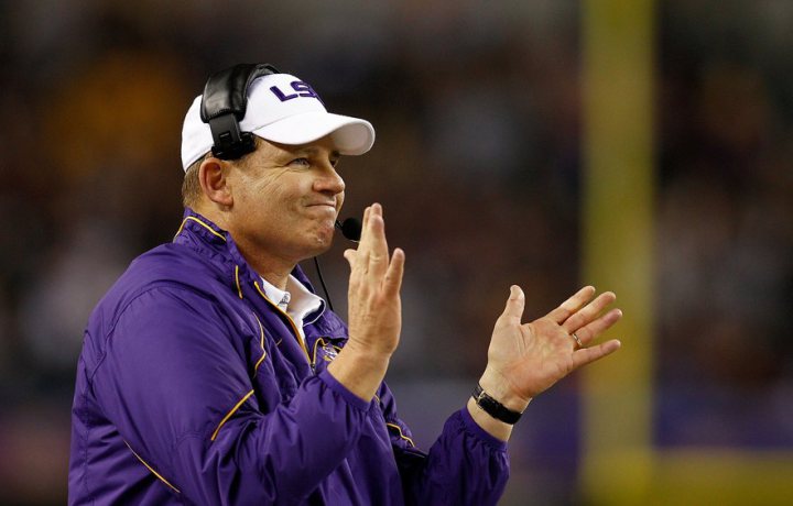 Les Miles : LSU Tigers Head Coach Les Miles really likes to get to know the stadiums he visits. Miles eats the turf at every stadium he visits.