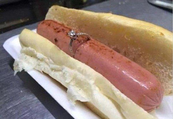 wedding ring on a hot dog