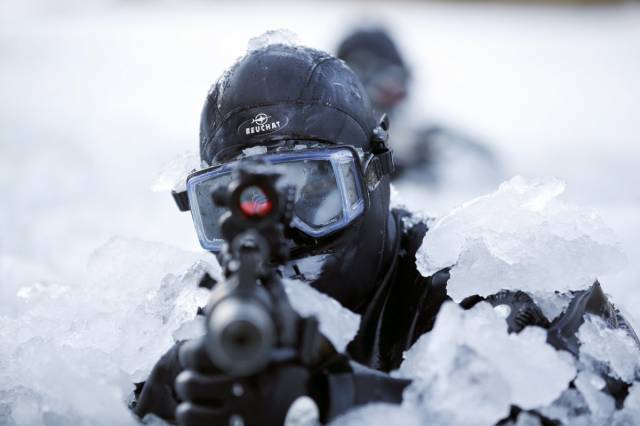 In South Korea, members of the country's Special Warfare Forces also train in icy conditions.