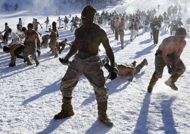 During joint exercises, US and South Korean Marines train together in the South Korean mountains.