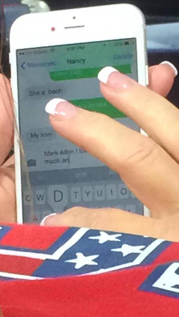“Mark Allen I lov … much,” said another text, partially obscured by the woman’s hand.