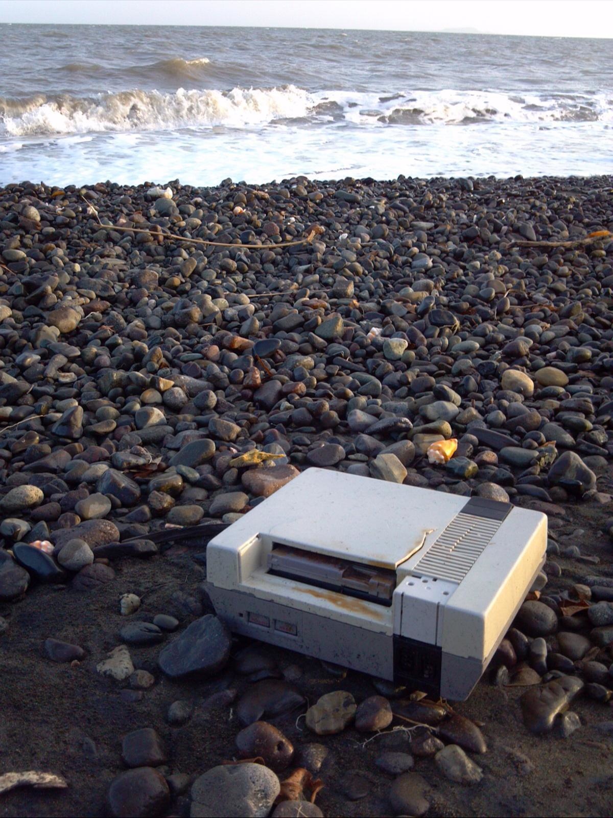 An NES found washed up on the beach.