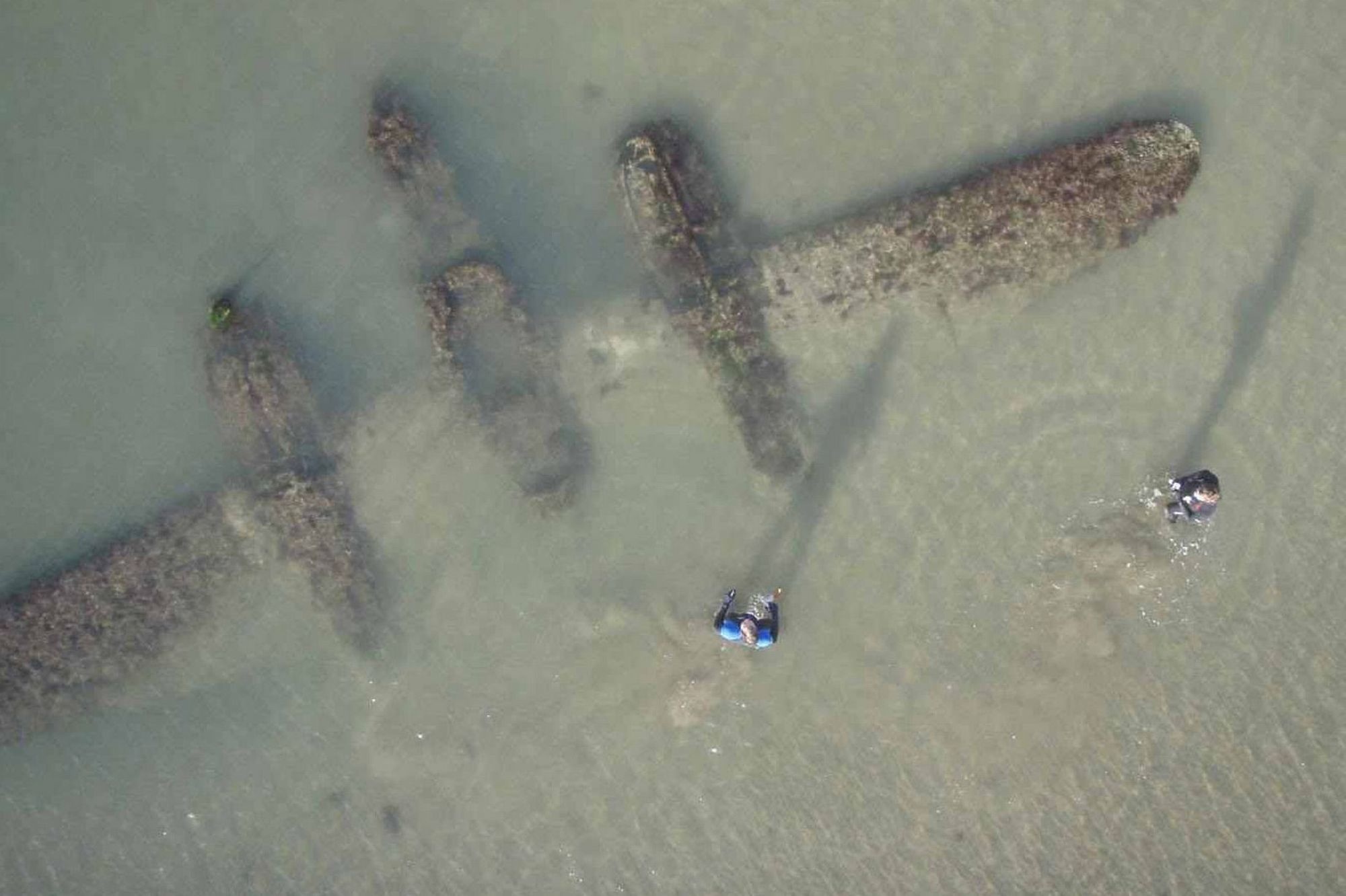 A P-38 plane, found on a beach in Wales.