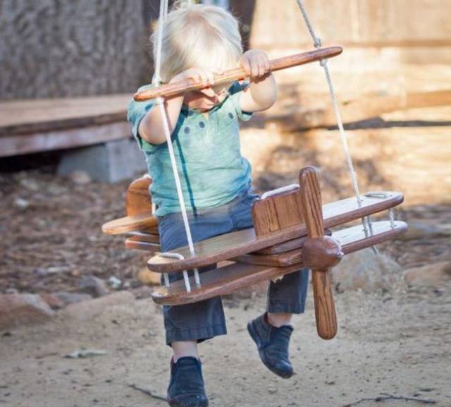 wooden airplane swing