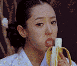 girl licking banana gif