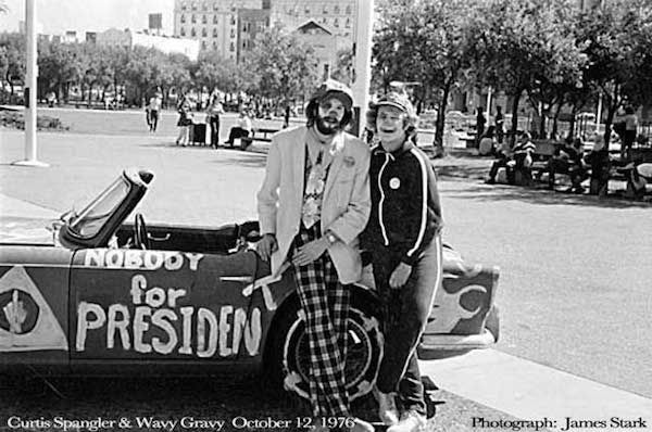 "Nobody For President" has been a trope since the 1940s but gained steamed during the counterculture era of the 1960s. In 1976, political activists Wavy Gravy and Curtis Spangler took up Nobody's cause. (Wavy Gravy had earlier conducted a mock campaign to elect a rock as president. The rock's running mate was a dinner roll, so the campaign slogan was "Rock and Roll Forever.")

The activists described Nobody as the candidate of the Birthday Party. Spangler appointed himself "Nobody's Campaign Manager" and Wavy Gravy served as "Nobody's Fool." They launched a cross-country tour on October 12, 1976, with a rally at San Francisco's Civic Center Plaza.

During the rally, Wavy Gravy (who wore clown makeup, a blue track suit, and a propellor cap) announced, "The Nobody motorcade has just been spotted. Nobody is headed this way." A sportscar then drove up with a wooden chair mounted on its trunk. Nobody was sitting in it.

Nobody then addressed the crowd. He was represented by a pair of plastic, wind-up teeth that Wavy Gravy placed before a microphone. The teeth chattered away as people asked questions about domestic and foreign policy.

Nobody and his campaigners then took off across the country in a bus. They held rallies in Los Angeles, Albuquerque, Austin, Washington, and ended up in New York City, where they held a victory celebration on election day, November 2. They pointed out that since 43% of all eligible voters had voted for Nobody, Nobody clearly won the election. 

The Nobody campaign continues to this day at nobodyforpresident.org. Spangler and Wavy Gravy still to promote the idea that Nobody (or "None of the Above") should be included as an option on all ballots so that voters wouldn't be forced to choose between the lesser of two evils.