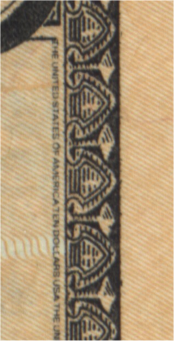 The same thing is printed along the inside of the border of the bill.
