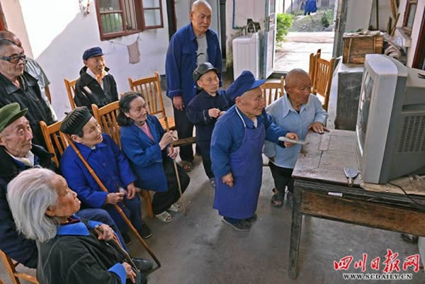 Yangsi, a remote village in southwest China's Sichuan Province, has baffled scientists for decades. About 40 percent of its inhabitants are several heads shorter than the average human being. 36 of the village's 80 residents are dwarfs—the tallest of that group is about 3'10" and the shortest, 2'1". That's too large a percentage to be a random occurrence, but so far no one has been able to provide a better explanation. In 1997, a new theory suggested a high concentration of mercury in the soil, but it has yet to be proven. 

Today, because of the large number of height-challenged residents, Yangsi is known as the "Village of Dwarfs." According to town elders, their peaceful, happy life was ruined on a summer night many years ago, when a vile disease struck the region. Several locals suffered from a mysterious condition that mainly affected young children between the ages of 5 and 7. These children just stopped growing, remaining at the same height for the rest of their lives. Apart from their inability to grow, some of the victims also suffer from various disabilities.
