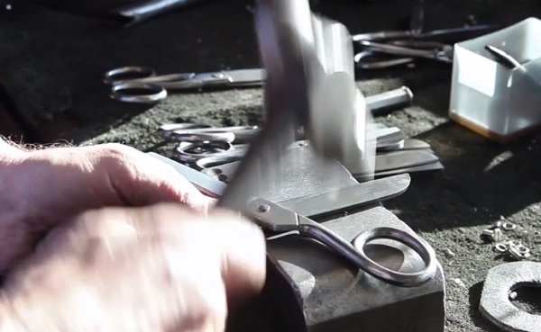 Ernest Wright and Son Limited may be the last factory in the world still making scissors by hand. 

In 2014, it looked as though they might close, but a video by photographer Shaun Bloodworth showing how the scissors are made went viral. Orders immediately went up, with a flood of requests from the U.S. 

Cliff Denton is a "putter" for Ernest Wright & Sons. He literally puts together scissors with his hands. Watching him work is mesmerizing and satisfying to see—it's basically art.