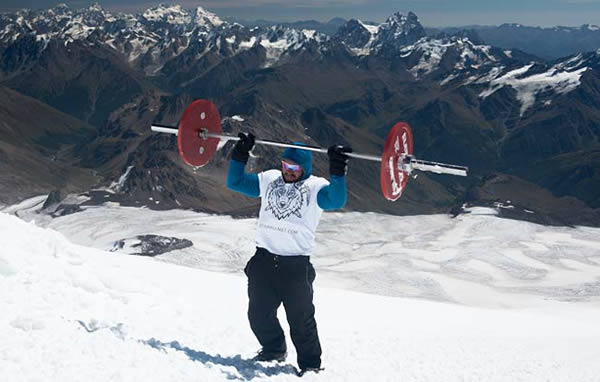 Many climbers have scaled Mount Elbrus—Europe's highest peak (5642 m)—but no one has quite managed to do it like Russian powerlifter Andrey Rodichev. He recently became the first person in the world to climb the mountain while carrying a 75 kg barbell on his back.

Even at the gym, that's a decent load for most people to lift, and Rodichev managed it in the most grueling of conditions. What he's essentially done is combine two very different sports—trekking, which requires amazing endurance, and powerlifting, which requires short bursts of pure muscle power. While the former requires lighter body weight, the latter demands that athletes bulk up. By fusing the two, Rodichev managed to set a new athletic standard.