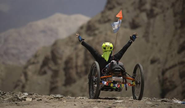 John Maggi suffered polio when he was a toddler and spent the first 50 years of his life without being able to walk. This native of Argentina regained that ability with the help of bionic legs and is another example of how technology offers hope for those who suffer similar ailments. 

In July 2015, he completed an amazing journey cycling through the Himalayas in northern India. The 15-day tour took him through an area called "Little Tibet" (known as a paradise for cyclists and mountaineers). For Maggi, the journey marks both a physical and spiritual rebirth and is a true feat.

Maggi used a bicycle propelled by his hands. He reached 5600 meters, the highest height that can be achieved in this fashion.