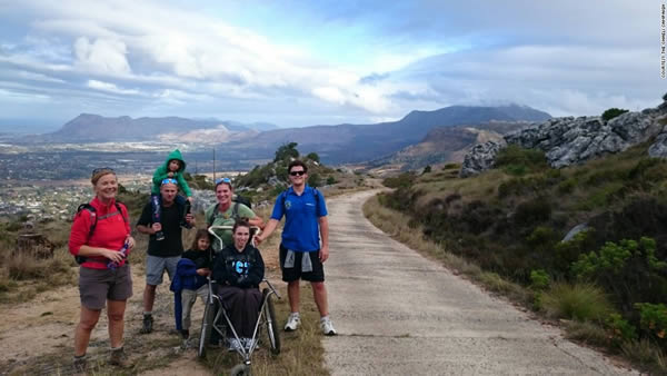 In September 2015, 21-year-old South African "ability activist" Chaeli Mycroft became the first female quadriplegic to reach the top of Africa's highest mountain, Kilimanjaro. Chaeli and her team—the Chaeli Kili Climbers—reached the summit after a grueling ascent that took five days. 

Born with cerebral palsy, Mycroft has never been one to let a disability get in the way of success. When she was just nine, she teamed up with her sister and three friends to raise R20,000 ($1500) for her motorized wheelchair. She later founded a non-profit organization that provides services to children with disabilities. Since 2004, the “Chaeli Campaign” has assisted over 3,000 children need with procuring wheelchairs, hearing aids, food supplements and more.

Kilimanjaro is enough of a challenge for able-bodied individuals. Facing altitude sickness, temperatures that fall below freezing, with minimal movement in her specially designed "mountain wheelchair," the expedition was anything but easy. But teamwork won in the end. With help from the Kili Climbers, who pushed, pulled and carried her through ice, snow, and tundra, the group finally made the summit.