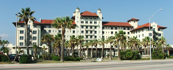 The Hotel Galvez is rumored to be one of the most haunted spots in Texas. Dubbed the “Queen of the Gulf,” this iconic hotel, overlooking the Great Seawall and Gulf of Mexico in Galveston, hoped to become a symbol of the city's restoration after the devastation caused by The Great Storm of 1900, but has been the site of unexplained occurrences since it opened. 

The Galvez was built on the site of St. Mary's Orphan Asylum, which was home to 93 orphans and the ten nuns that took care of them. When the Great Storm hit the city, the nuns, hoping to keep the children safe, tied clothesline around their waists. Ultimately, all but three children were killed, and it is believed that that the dead were buried beneath where the hotel now stands. 

The luxurious and glamorous Galvez has been frequented by movie stars and presidents throughout its history, but the place is notorious for its spine-tingling paranormal activity. If you're feeling a bit brave, book rooms 501 and 505. Tour guides also suggest having your camera ready.