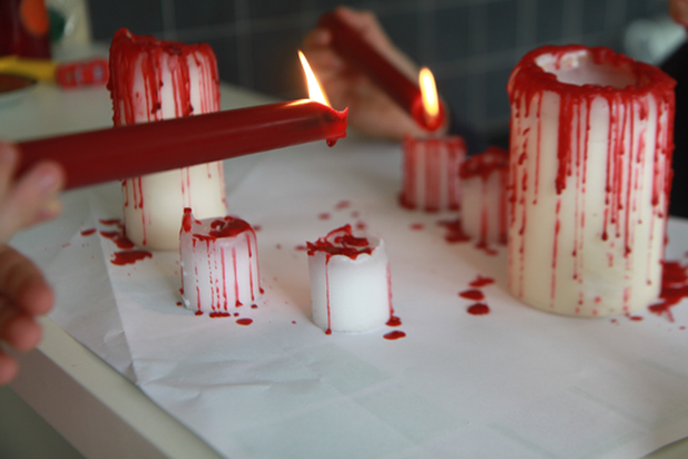 This incredibly easy project lets you make creepy but elegant candles for your next spooky soiree. All you need is a collection of white candles and one red candle to drip on the others.