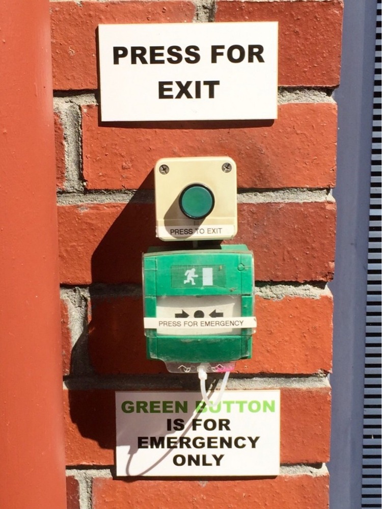 confusing signs - Press For Exit Press To Exit Press For Emergency Green Button Is For Emergency Only