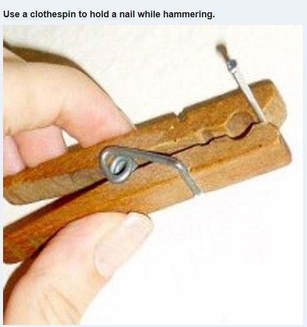 hammer nail hack - Use a clothespin to hold a nail while hammering.