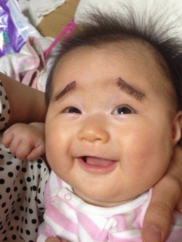 babies with eyebrows drawn