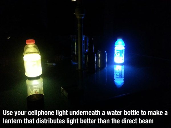 life hacks to make your life easier - Use your cellphone light underneath a water bottle to make a lantern that distributes light better than the direct beam