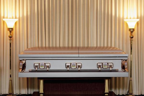 A South African man was shocked when he opened the casket at his beloved wife's funeral and found a complete stranger lying inside.

Michael Galant's 58-year-old wife, Magdalene, died on January 26, 2013. While friends and family crowded into the church funeral ceremony, Galant and his daughter, Leota Lakay, realized they had a crisis on their hands as they stared down at the stranger's body. 

They spoke up about their suspicions, but the undertakers tried to insist that the body they'd delivered was indeed Magdalene's. Rumors of the mix-up started spreading through the crowd. Eventually, the funeral directors admitted that they'd pulled the wrong drawer out of the morgue. However, when the Galants wanted to halt the funeral service immediately, the undertakers convinced them to bury the stranger.

After the ceremony, funeral service staff took the family to the mortuary. Magdalene was still there. The funeral directors apologized for handing over the wrong body and have promised to help the Galants arrange another funeral.