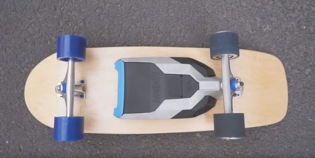 Stick this device to the bottom of any skateboard to create a sweet, self-propelling board.