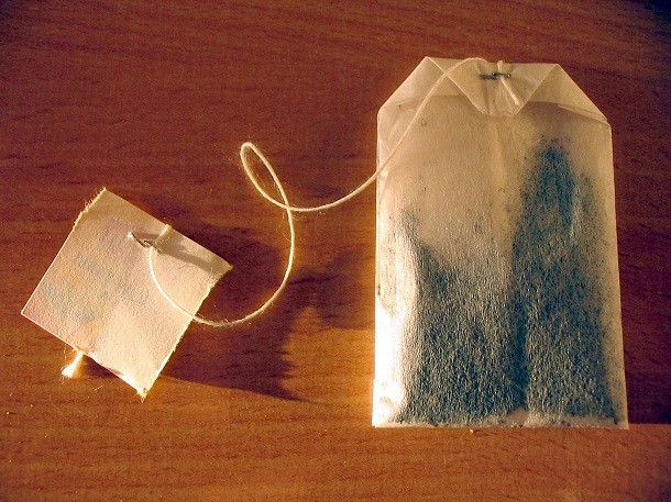 Tea bags are multi-functional items which can be used as anything from a deodorizer to a fire-starter. To use them as kindling, stuff dry (used or unused) teabags into the cardboard tube from a finished roll of toilet paper. The lint from your dryer also makes great kindling and can be stuffed in before lighting the tube ablaze.