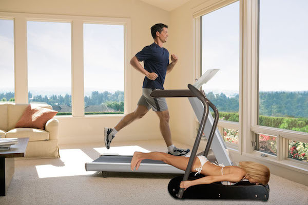 Woman in bikini holding a treadmill gets photoshopped