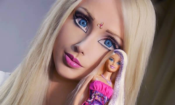 Three years ago, the whole world became obsessed with Valeria Lukyanova, aka the "Human Barbie." She refuses to give her age, but various reports put her anywhere from 24 to 29 years old. 

Everyone marveled at her physical Barbieness—huge boobs, tiny waist, long blonde hair, and creepily disconcerting made-up doll eyes. The Internet peanut gallery debated as to whether or not she'd removed ribs to make her waist appear smaller, and if it was indeed possible to survive on light and air, as she claimed she did. Some even accused her of Photoshopping her images.

In addition to her extreme physique (the only surgery she's admitted to is breast implants), she has created an intriguing backstory around herself. She claims to be able to speak to aliens, to time-travel and is spiritual leader called Amatue. She continues to share her life online, often posting multiple images per day of herself in rapid succession on Instagram, where she posts as Amatue. She is a self-described "opera/new age" singer, as well as an "actress, writer, and poet," according to her profile.