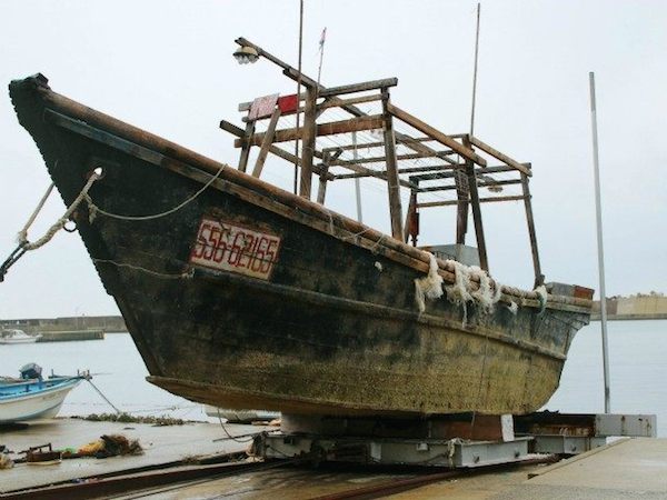 At least 12 wooden boats have been found adrift along Japan's coast carrying chilling cargo—the bodies of 22 people in varying stages of decay. 

The first boat was found in October 2015, and then a series of vessels were found in November. As of this writing, they are still being found. The latest, discovered floating off the north coast of Japan's main Honshu island, contained four bodies, all of which were "partially skeletonized."

The ships are believed to be from North Korea. Korean lettering was found on the hull of a boat containing ten decomposing bodies, which was one of three boats that were found adrift off the west coast of Japan on November 20. The writing said "Korean People's Army"— the name of North Korea's military defense forces. 

But what the boats are is still a mystery. Some believe the vessels were fishing vessels that strayed off course while others suggest they could be transporting defectors.