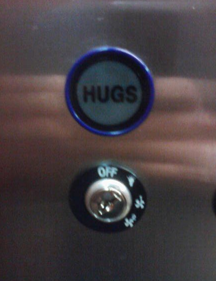 mystery button emblem - Hugs