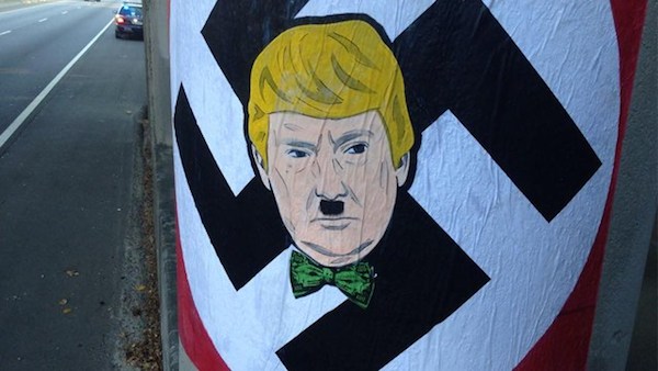 The backlash over Trump's controversial comments against Muslims has spread to Atlanta in the form of street art. Posters of Donald Trump's face with a Hitler mustache against a Nazi flag background were seen alongside at least two busy roads during the morning rush hour.

Police removed the posters once a forensic photographer took pictures for evidence and are actively looking for the person(s) responsible. They describe the art as dangerous because it may distract drivers passing by at high speeds.