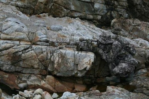 sniper camouflage rock