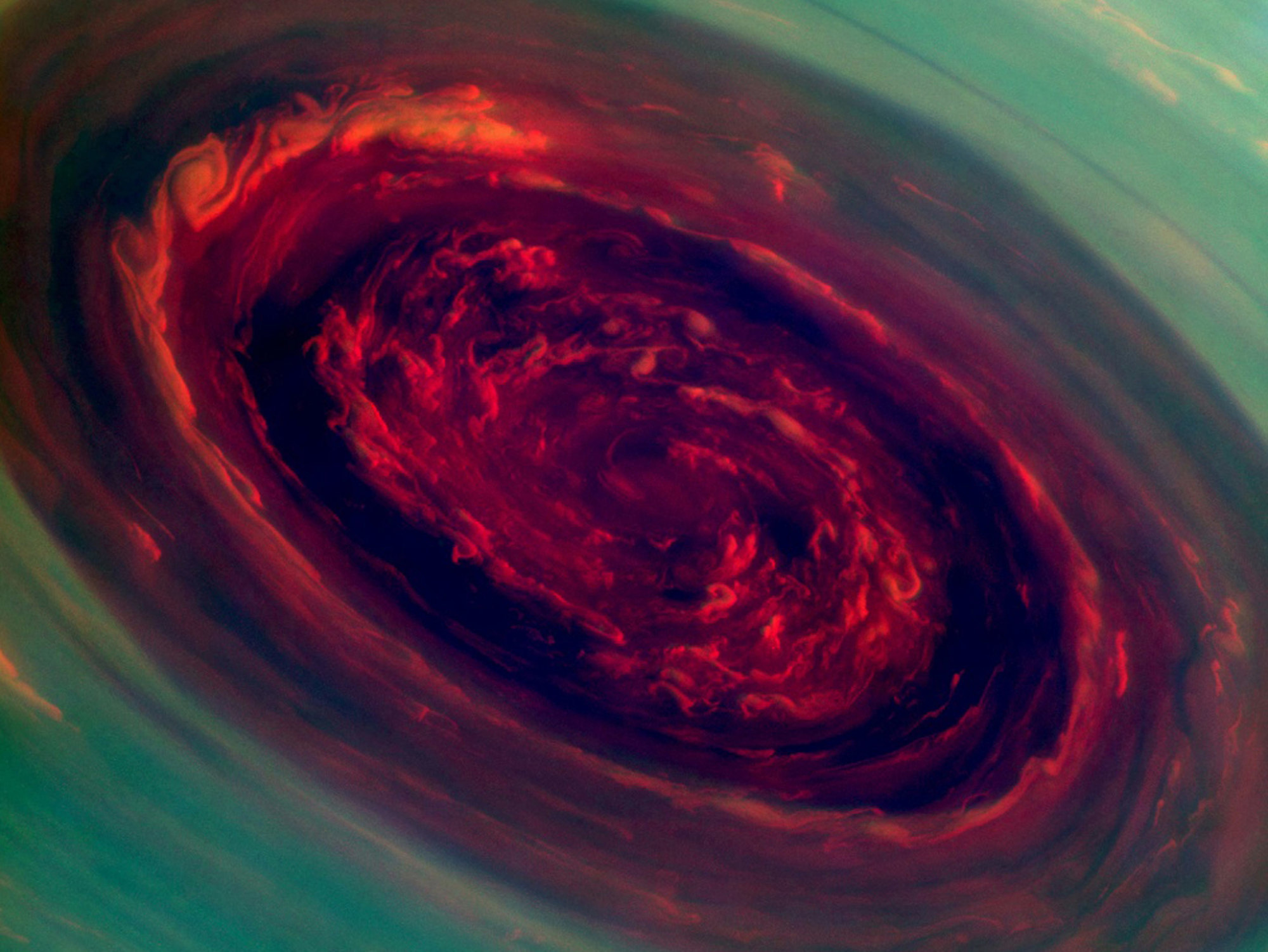 A hurricane on Saturn so big that 2 Earths could fit inside it.