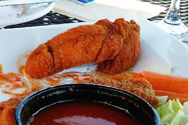 And speaking of no longer having an appetite, either somebody at Tyson's was extremely bored earlier this year, or this is the biggest coincidence in the history of mankind. A Buffalo chicken tender that looks more like it could be Ernie from Sesame Street's dick than an edible menu item?