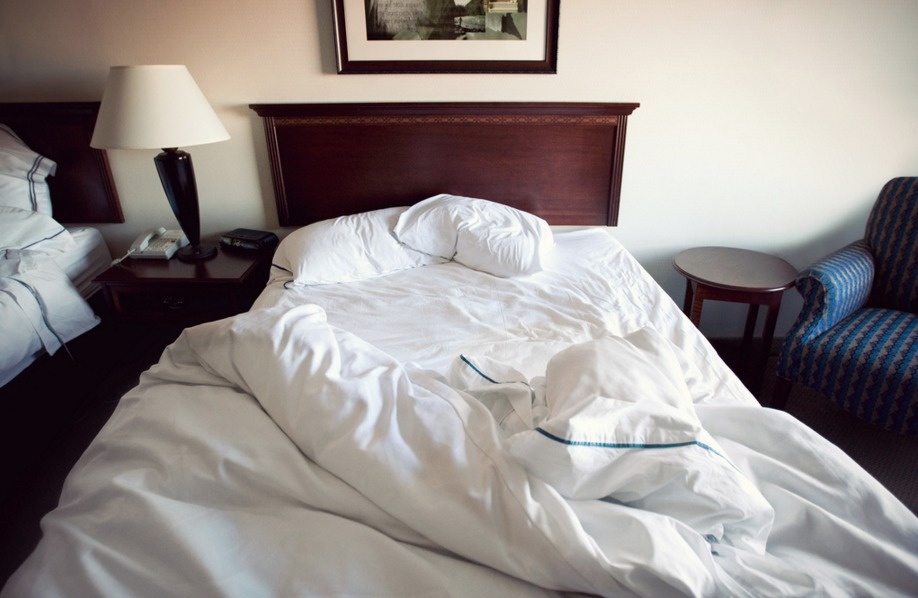 White duvet covers at hotels are only washed when there are obvious stains. In other words, there are a lot of hidden stains that go unchecked. Yikes.