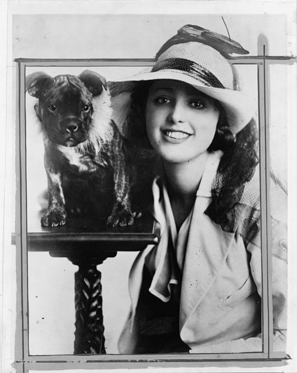 Virginia Rappe was an American model and silent-film actress in the early days of the twentieth century. The circumstances of her death in 1921 became a Hollywood scandal and were covered widely by the media at the time. During a party on Labor Day, September 5, 1921, she was in a hotel room with fellow silent-film actor Roscoe “Fatty” Arbuckle in San Francisco. Rappe allegedly suffered a trauma and died on September 9 from a ruptured bladder and secondary peritonitis. Arbuckle was charged with her murder. Some believed he squashed her with his weight while raping her, others believe he raped her with a foreign object, causing peritonitis. Unfortunately, we will probably never know what happened that night.