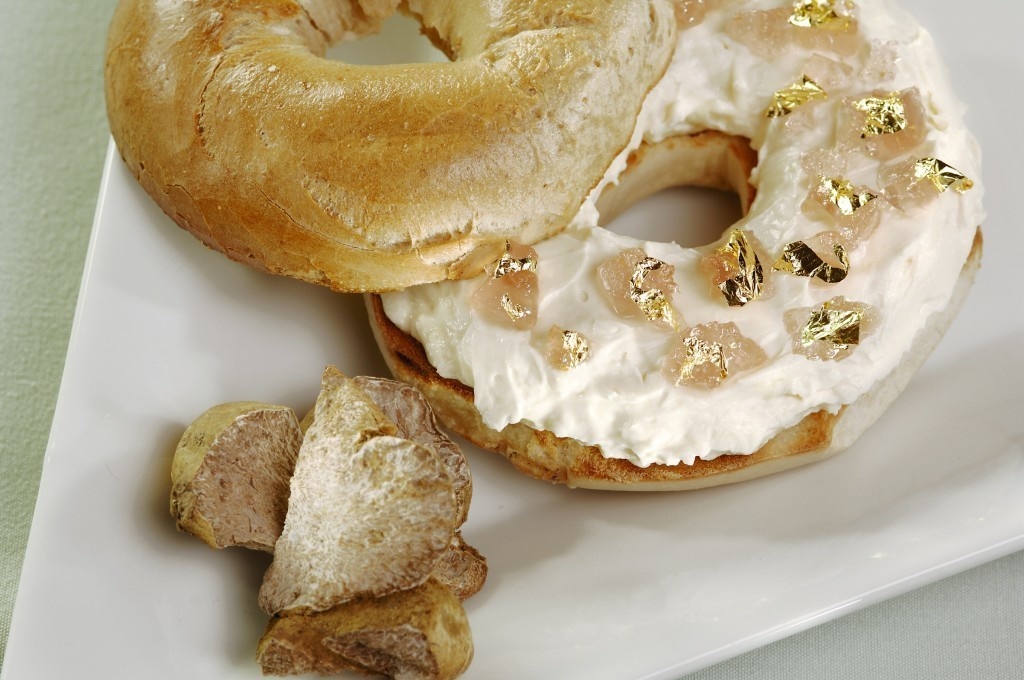 In 2007, the regular bagel received a makeover. Chef Frank Tujague made this New York staple into a treat for the elite. The popular breakfast favorite features Alba white truffle cream cheese, goji-berry Riesling jelly, and speckled with gold leafs. Customers have to order it 24-hours in advance and it is only served for breakfast.