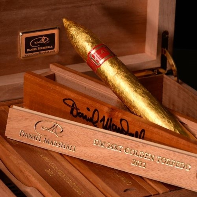 Granted, this isn't a food item but Daniel Marshall's creation may set back your grocery money. The 24-karat gold leaf-covered cigar is made with premium tobacco.